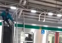 মেট্রোরেলের ছাদে উঠলেন দুই ব্যক্তি, বন্ধ ট্রেন চলাচল